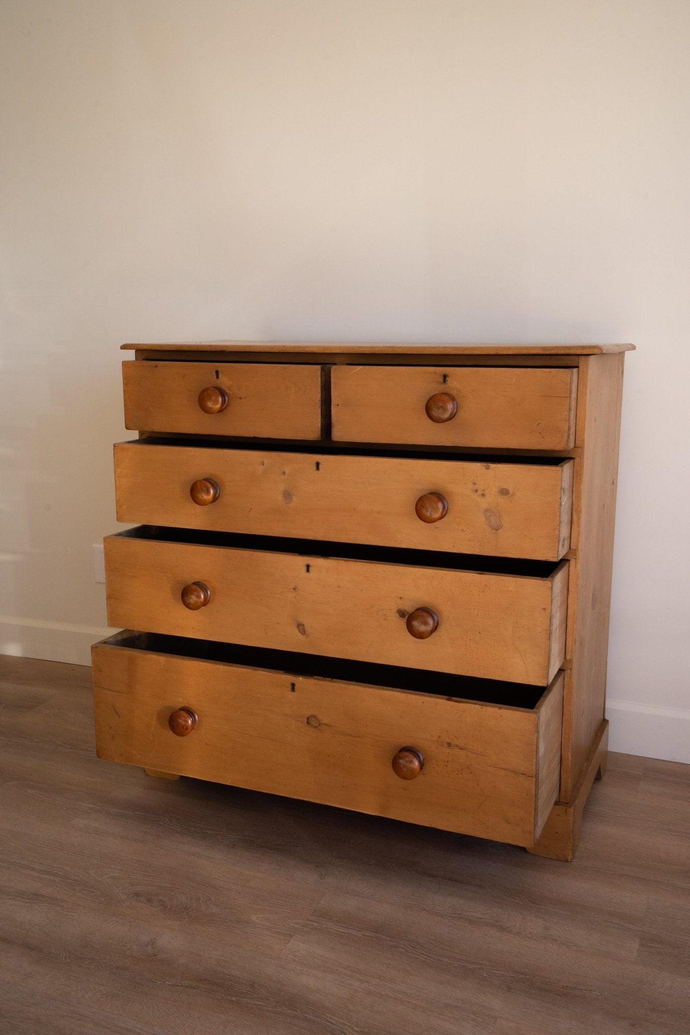 Light Pine Chest of Drawers with Dark Knobs - IDYLL MANOR
